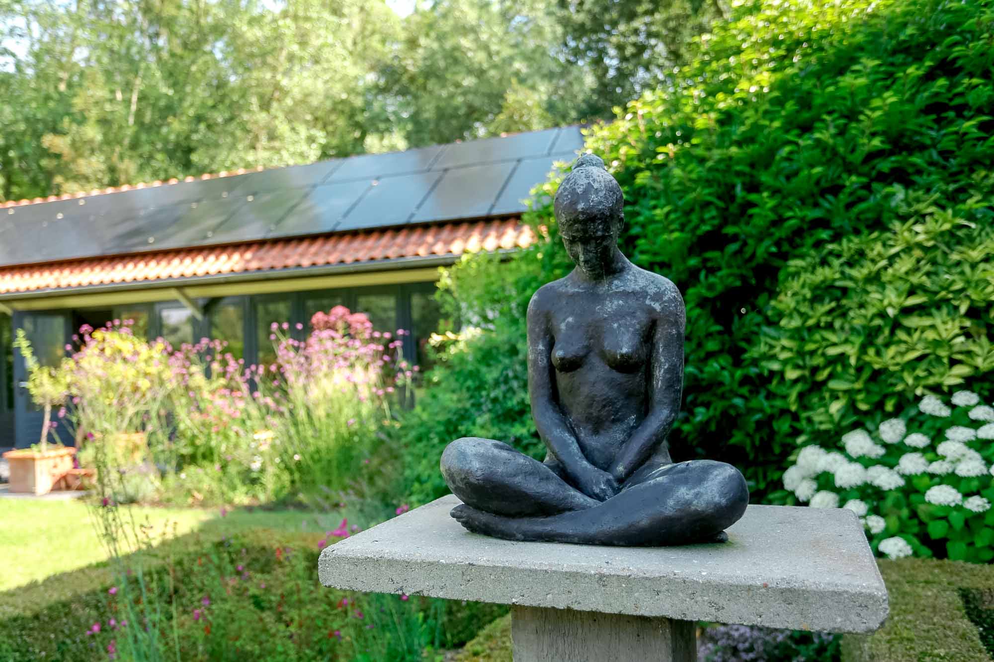  Female sculpture inside the garden 